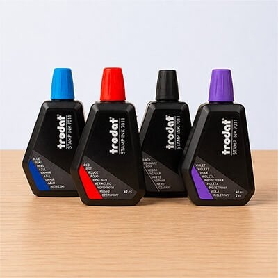 Image of stamp ink refill bottles in assorted colors
