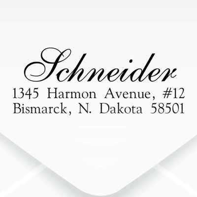 Schneider Script Address Stamp impression on an envelope