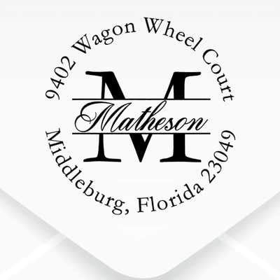 The impression of the Letter Script Name Return Address Stamp on a white envelope