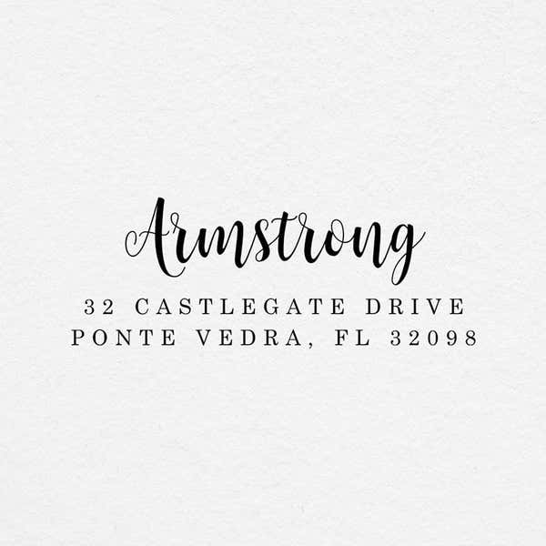 Impression of the Armstrong Address Stamp on grey textured paper
