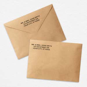 3 Line Stamp Custom Return Address Stamp on a brown envelope  