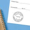 District of Columbia Real Estate Appraiser Seal impression at the bottom of a document with a blue background