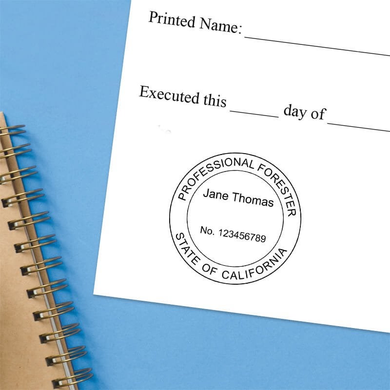 The State of California Forester Seal impression at the bottom of a document with a blue background