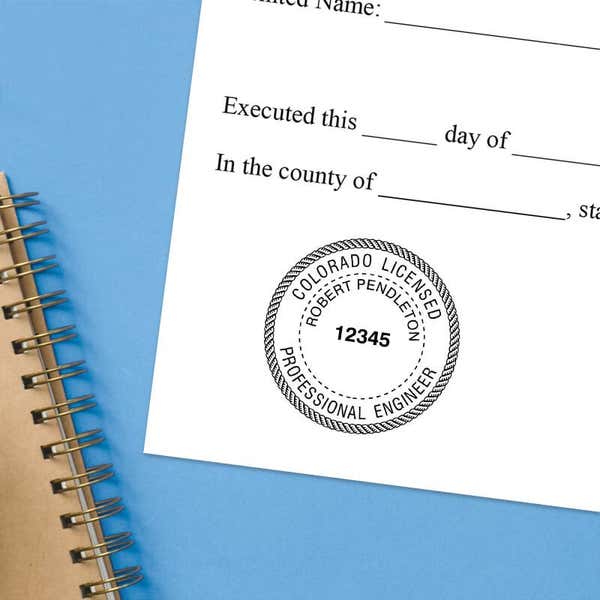 The State of Colorado Engineer Seal on a document with a blue background