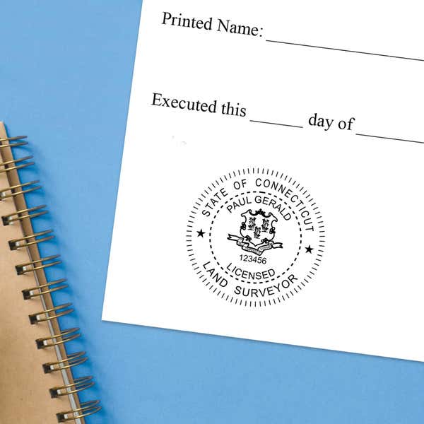 The State of Connecticut Land Surveyor Seal impression at the bottom of a document with a blue background