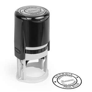 The State of Georgia Engineer Seal impression and a self-inking stamp on paper