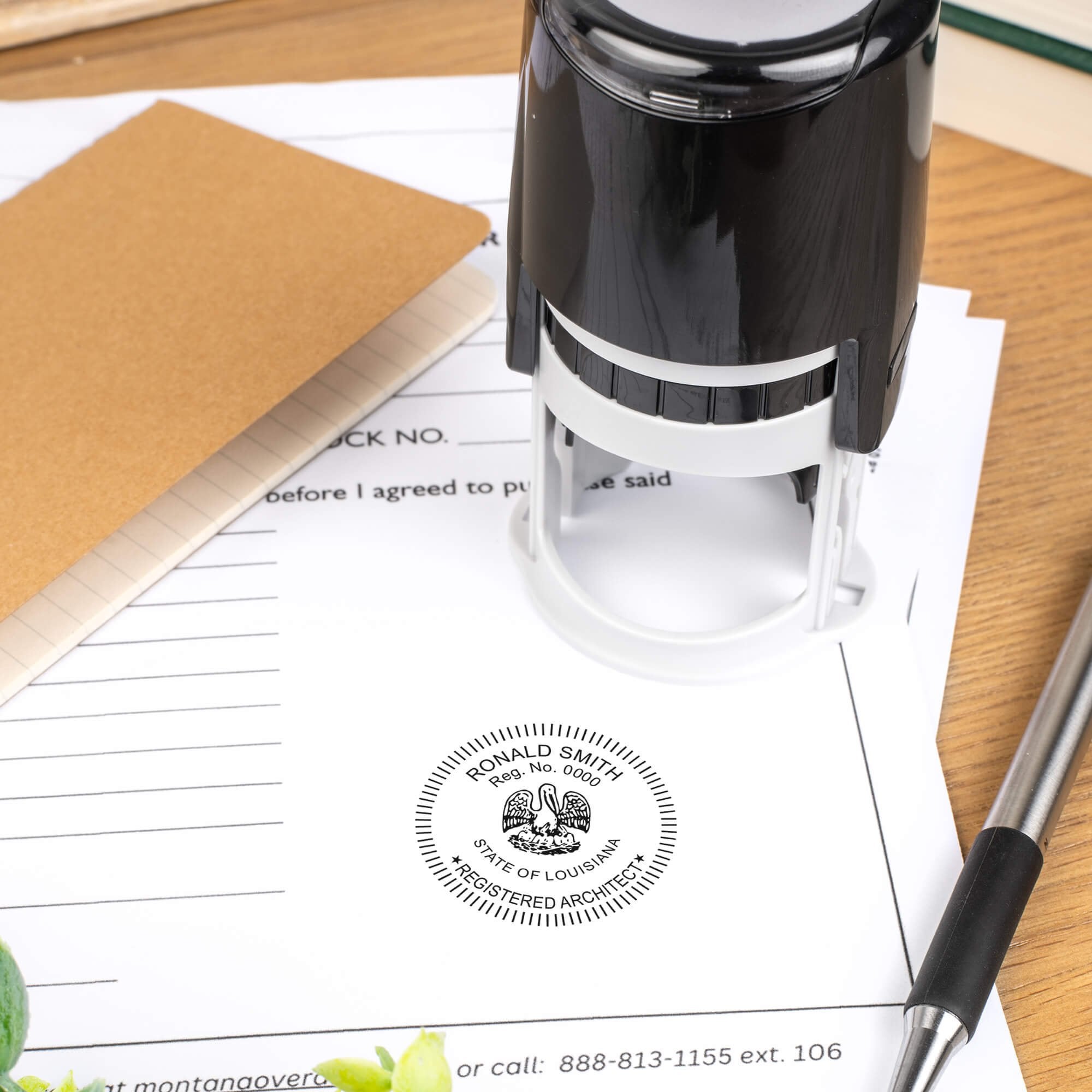 A self-inking stamp placed next to the State of Louisiana Architect Seal at the bottom of a document