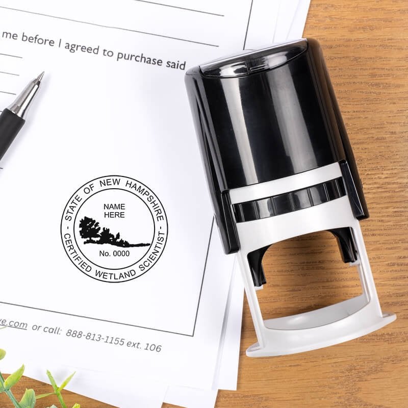 A self-inking stamp placed next to the State of New Hampshire Wetland Scientist Seal at the bottom of a document