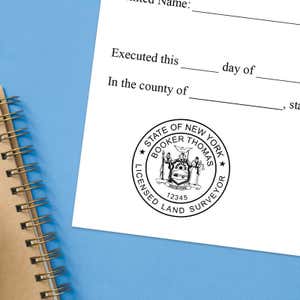 The New York Land Surveyor Seal on a document with a blue background