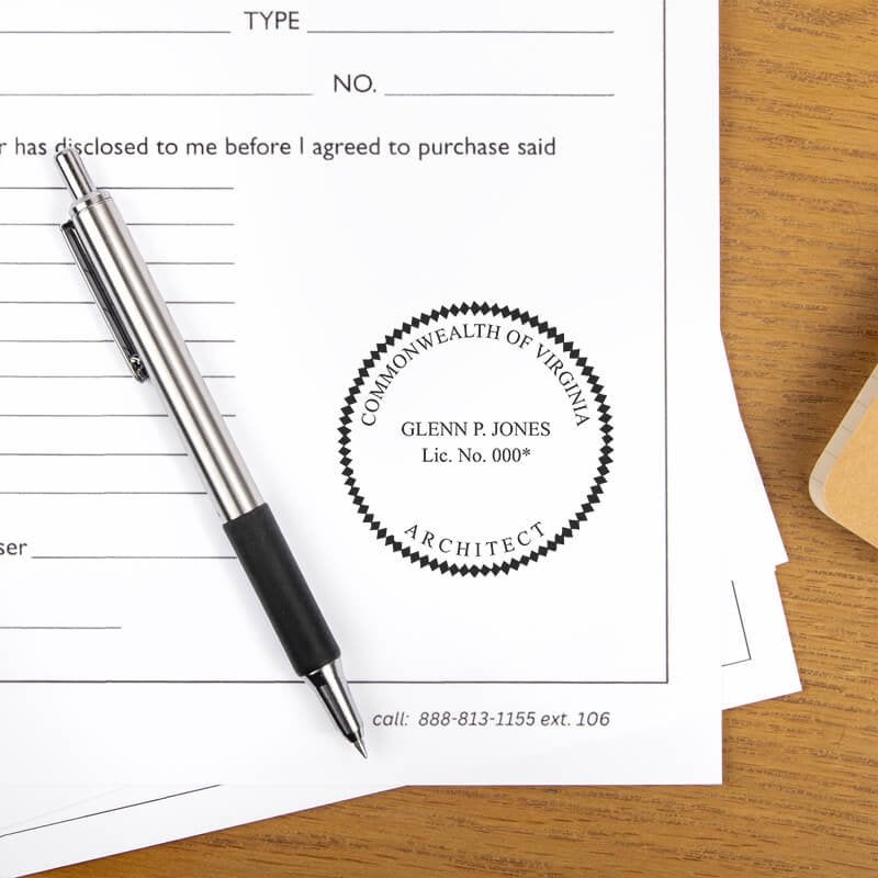 The State of Virginia Architect Seal on the bottom of a document next to a pen