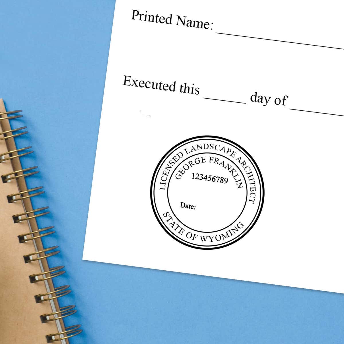 The State of Wyoming Landscape Architect Seal impression at the bottom of a document with a blue background