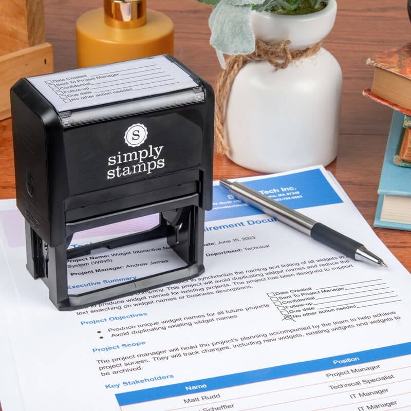 Simply Stamps self-inking checklist stamp on project document for office or business use