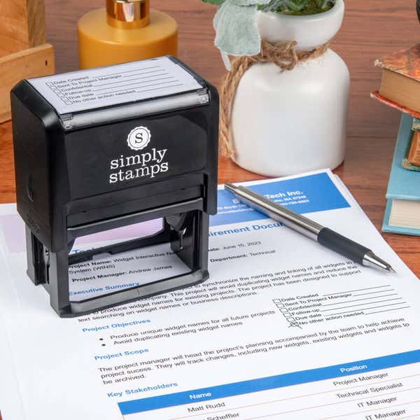 Simply Stamps self-inking checklist stamp on project document for office or business use