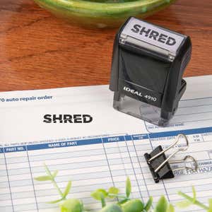 Custom stamp and impression on a work document. 