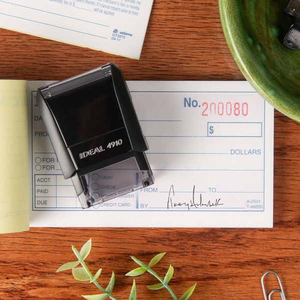 Custom signature stamp on check with Ideal 4910 self-inking stamp