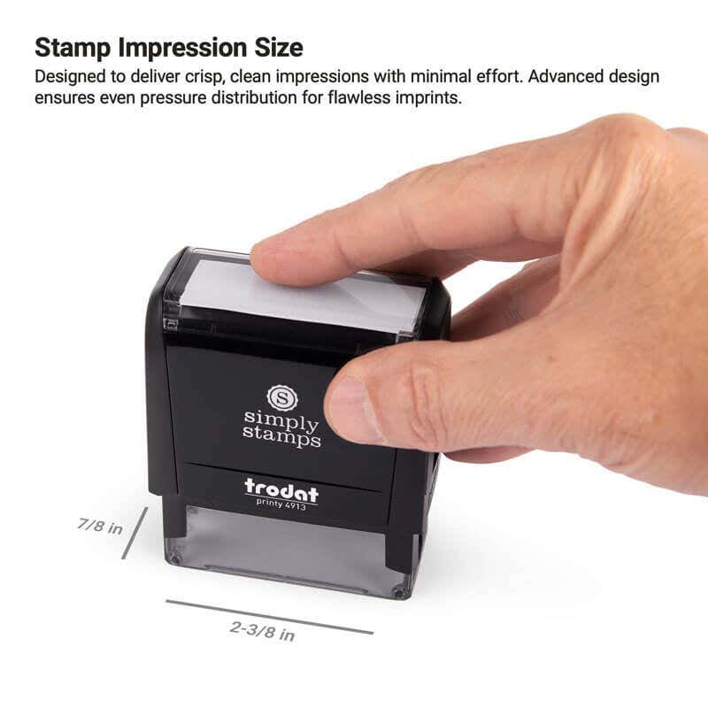 Hand pressing down on a Simply Stamps Trodat Printy 4913 self-inking stamp, with dimensions labeled as 7/8 inch by 2-3/8 inch to show impression size.