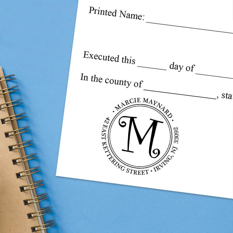 Stamped document featuring a custom return address stamp with a decorative “M.”