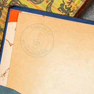 Example of Treble Clef Music Symbol Custom Book Embosser impression in book
