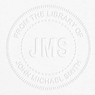 Example of From the Library Initials Personalized Book Embosser Imprint on grey paper
