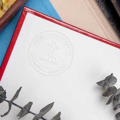 Example of personalized book embosser impression on book