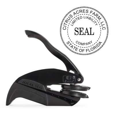 The Limited Liability Company Seal Embosser with Year is pictured with the Pocket Seal by Trodat.
