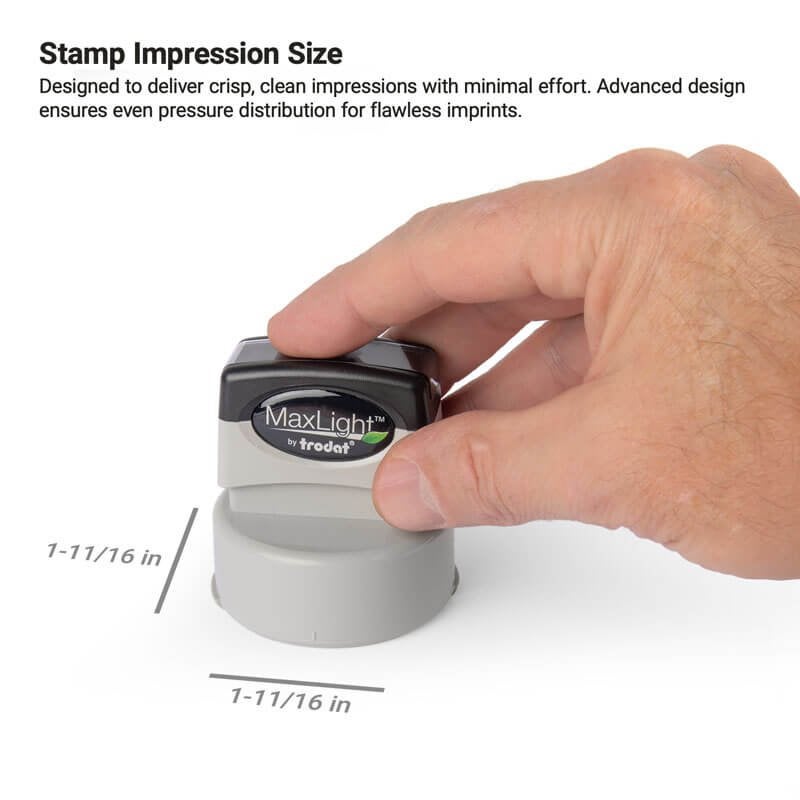 Hand pressing down on a MaxLight by Trodat pre-inked stamp, showing impression size dimensions of 1-11/16" x 1-11/16"