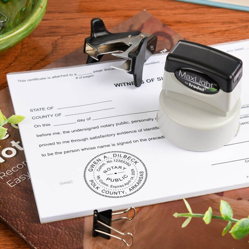 Round pre inked Notary stamp on paper 