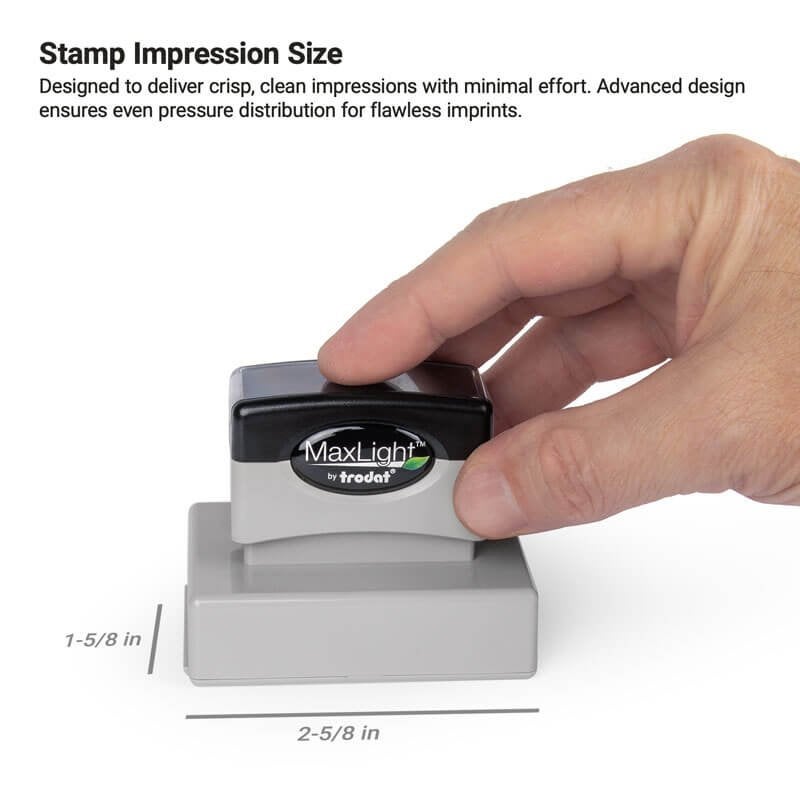 Hand using MaxLight pre-inked stamp showing impression size of 1-5/8" x 2-5/8"
