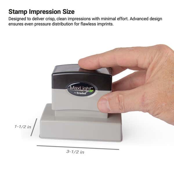 MaxLight stamp in hand with labeled impression area of 1-1/2" x 3-1/2"