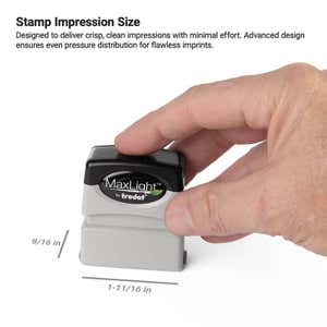 Demonstration of a pre-inked stamp impression area measuring 9/16 in x 1-11/16 in