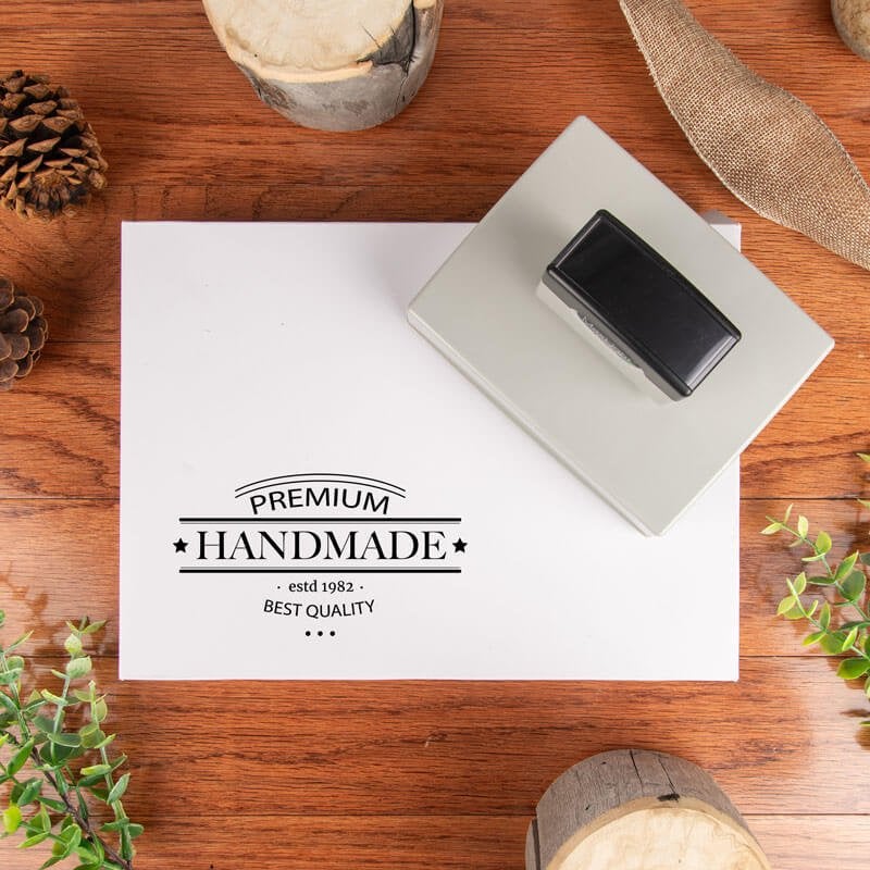 Custom logo stamp applied to white product packaging