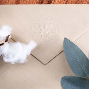 Raised impression made by the Williams Monogram Round Return Address Embosser