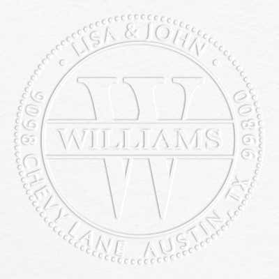 Example on grey paper of the impression made by the Williams Monogram Round Return Address Embosser