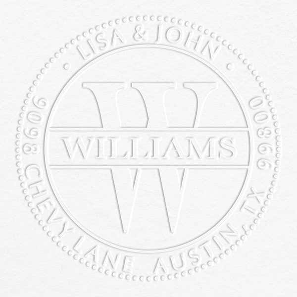 Example on grey paper of the impression made by the Williams Monogram Round Return Address Embosser