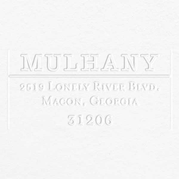 Example of the impression left on grey paper from the Mulhany Rectangular Return Address Embosser