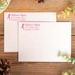 Example of pink ink address stamp with ribbon design 