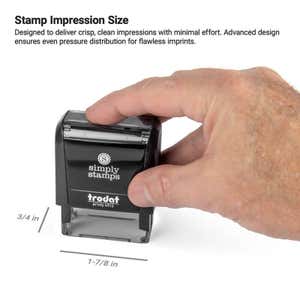 Hand pressing the Trodat 4912 stamp to demonstrate a 1-7/8" x 3/4" rectangular impression area