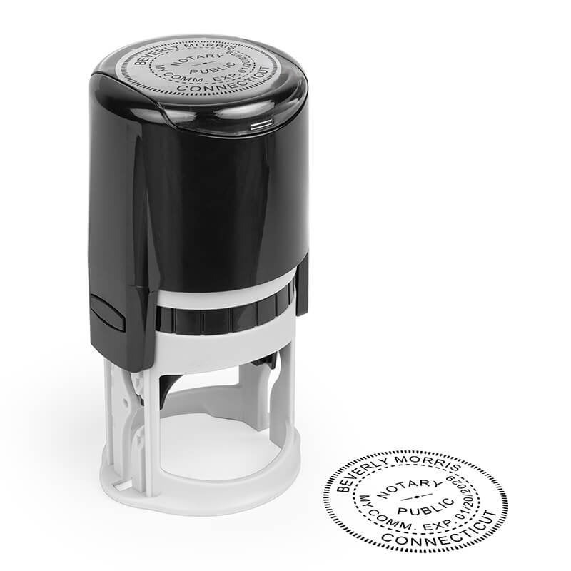 Impression of notary stamp next to stamp body