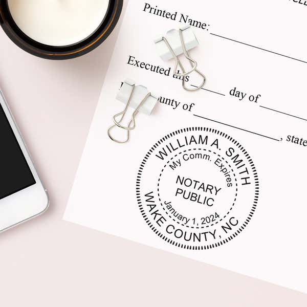 The North Carolina Notary With Expiration Date Round Stamp is available in multiple stamp types