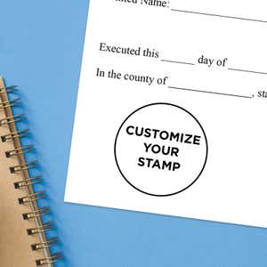Impression of a round stamp impression that says Customize your stamp