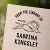 Personalized book stamp impression on white paper