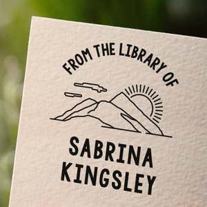 Personalized book stamp impression on white paper