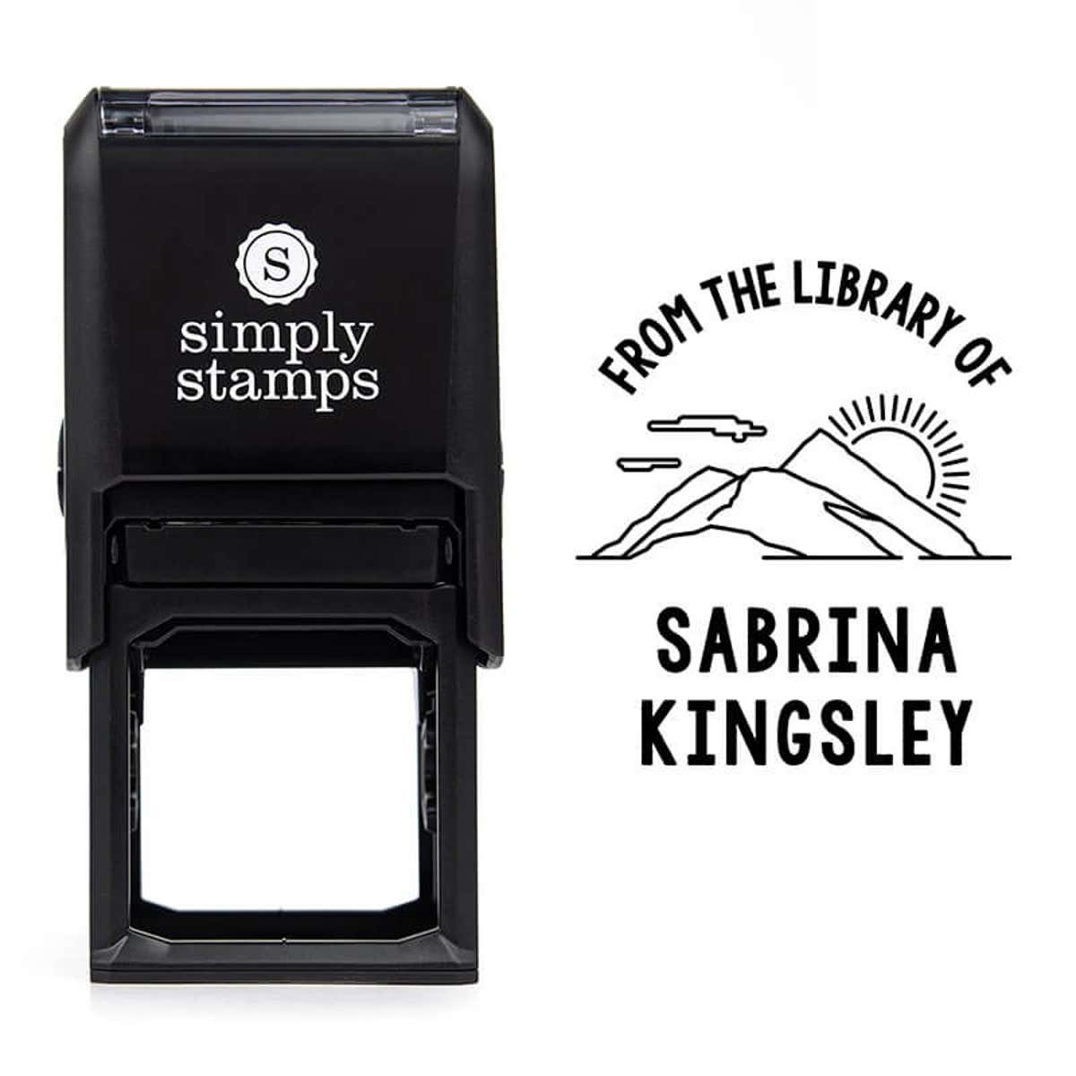 Front view of self-inking stamp body with library book stamp impression example