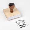 Wood handle stamp body with book stamp impression