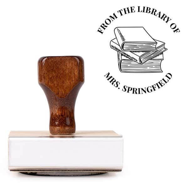 Front view of wood handle stamp body with library book stamp impression