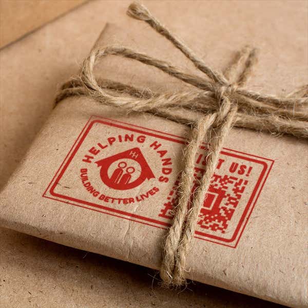logo stamp impression on a parcel from a 3.5"x2" European Hand Stamp