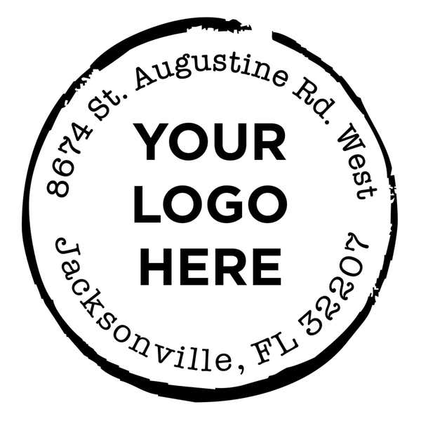 Close-up of the stamped logo impression on a white background