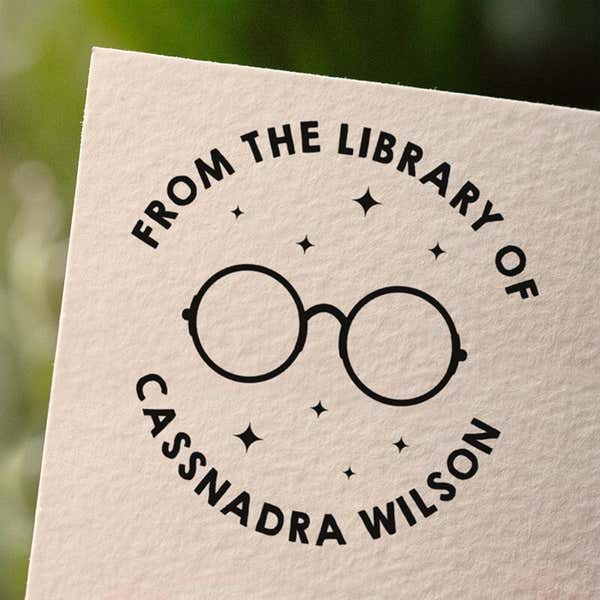Personalized book stamp impression on white paper