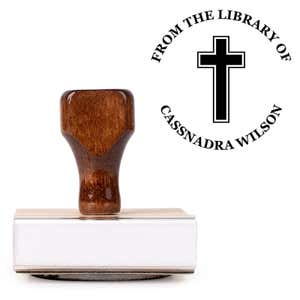 Front view of wood handle stamp body with library book stamp impression