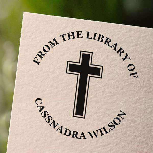 Personalized book stamp impression on white paper